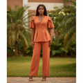 Women's terracotta flutter sleeve deep V silver button blazer top and wide-leg trouser suit - model shot