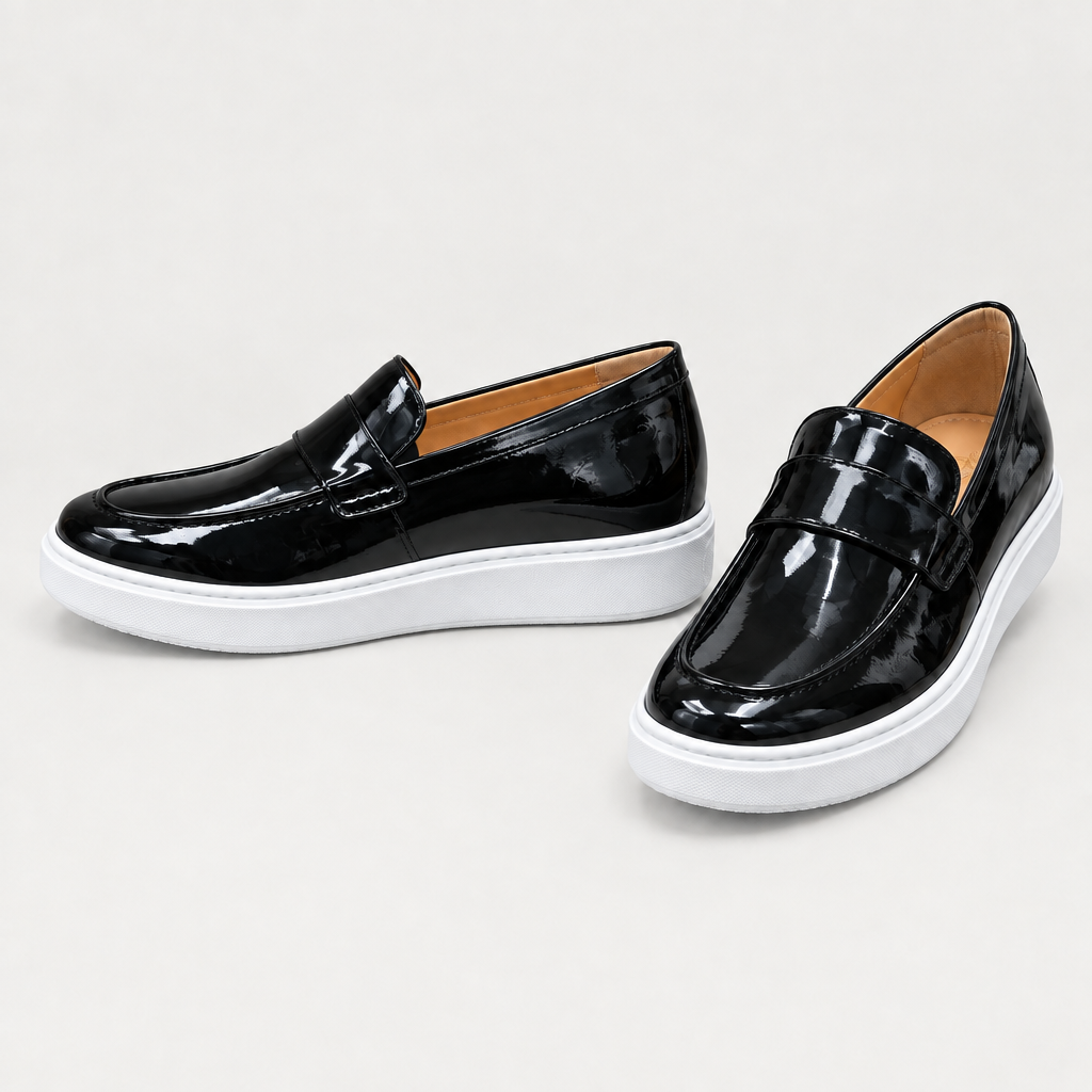Glossy black slip-on loafers with a wide vamp strap and white sole