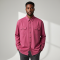 Male model wearing fuchsia pink long sleeve shirt