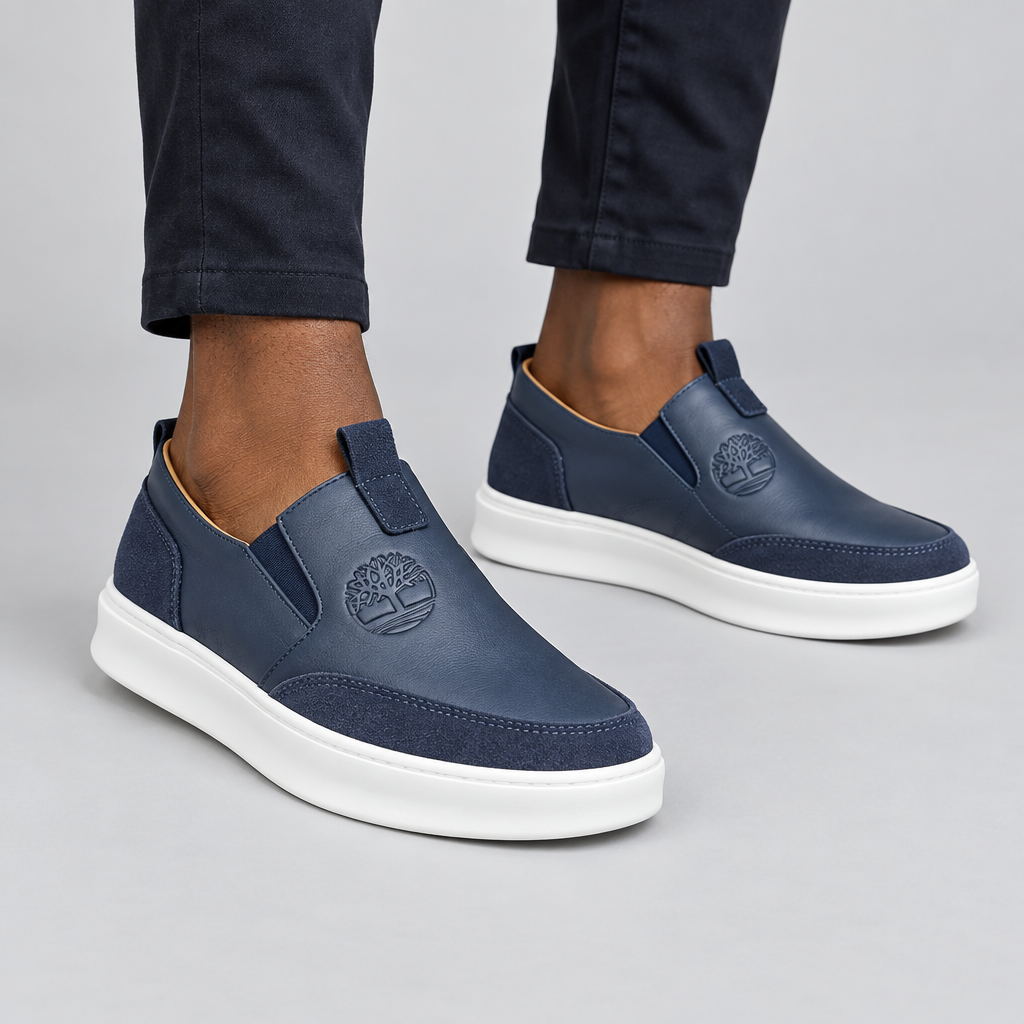 Navy Leather Slip-On Sneaker with Embossed Logo – Model Shot