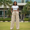 Nigerian female model wearing Women's Cream Wide-Leg Baggy Cargo Trousers