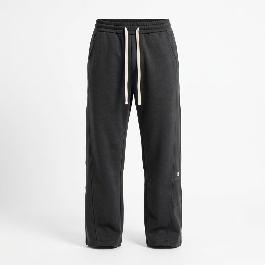 Men’s charcoal joggers with cream drawstrings and a small lower-leg number detail, generated ghost mannequin view