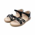 Girls black patent cross-strap flat sandal ghost mannequin pair view