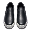 Black slip-on sneaker pair with elastic side panels and white soles