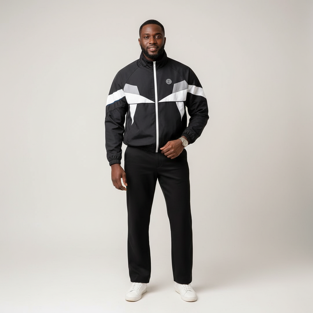 Model wearing the black and grey colourblock track jacket