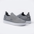 Pair of grey knit panelled slip-on sneakers on white
