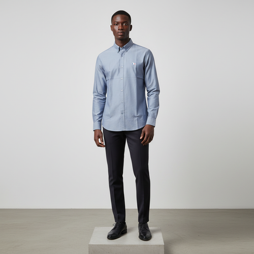 Nigerian male model wearing steel blue plain long-sleeved shirt, front view