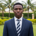 Nigerian male model wearing navy blue and white bold diagonal stripe regimental necktie with white shirt and navy suit