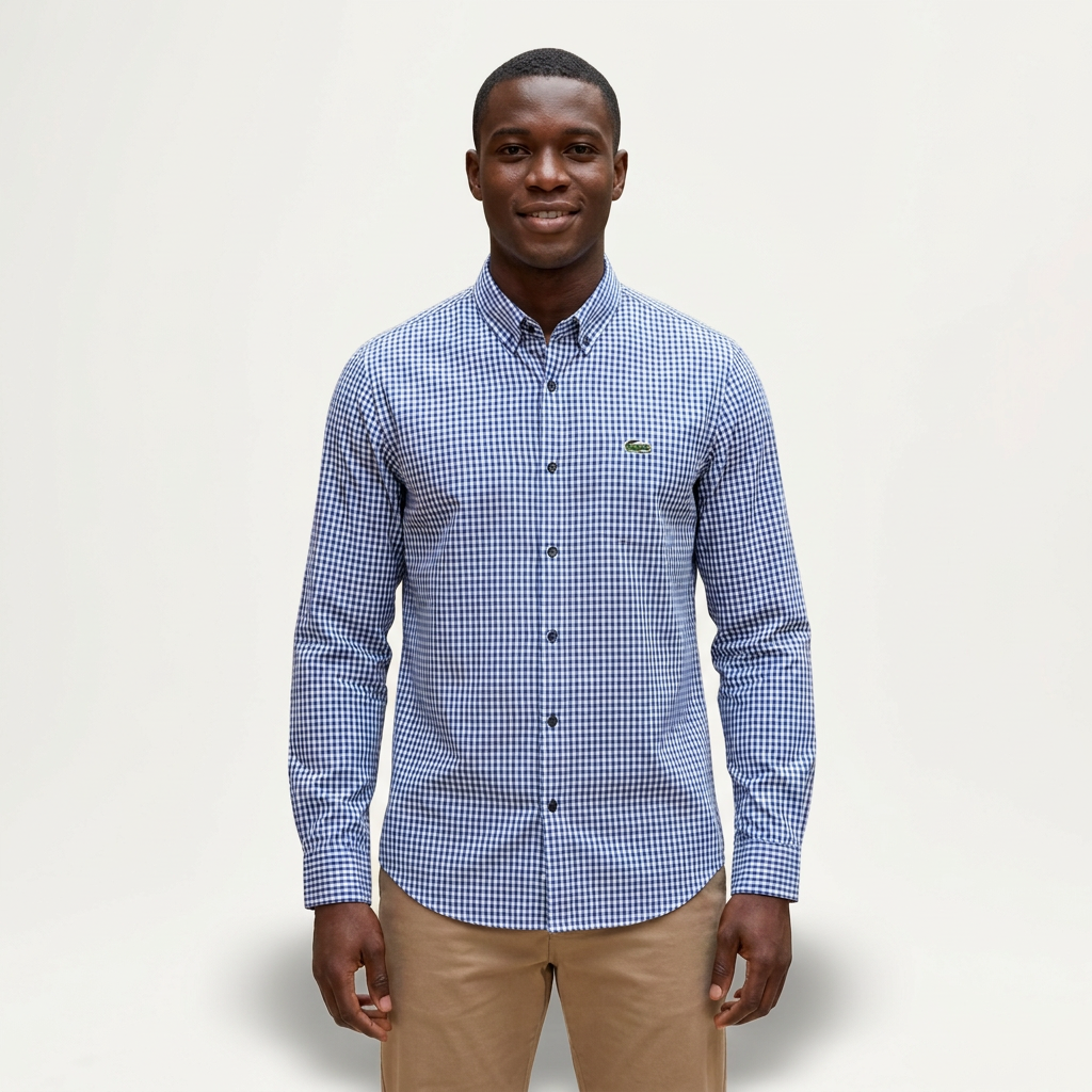 Male model wearing a blue and white gingham long-sleeve shirt against a plain off-white background