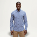Male model wearing a blue and white gingham long-sleeve shirt against a plain off-white background