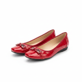 Women's red patent flat pumps with bar buckle – ghost mannequin pair view