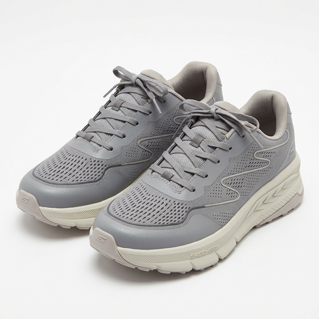 Pair of grey mesh sneakers with sculpted off-white soles on white