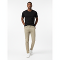 Nigerian model wearing khaki slim fit jeans
