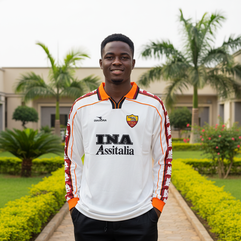White and burgundy long-sleeve retro football jersey — Nigerian male model front view