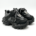Matching black and grey face-motif chunky trainers