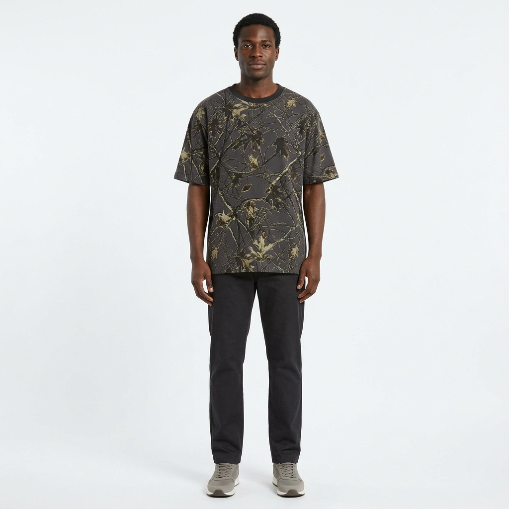 Full-body model wearing charcoal woodland-print crew-neck T-shirt