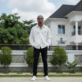 Men's White Heart Logo Long Sleeve Shirt – Nigerian Male Model Shot
