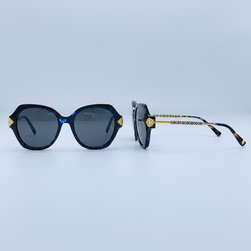 Unisex oversized round blue tortoise sunglasses with gold hinge detail – front and side view on white background