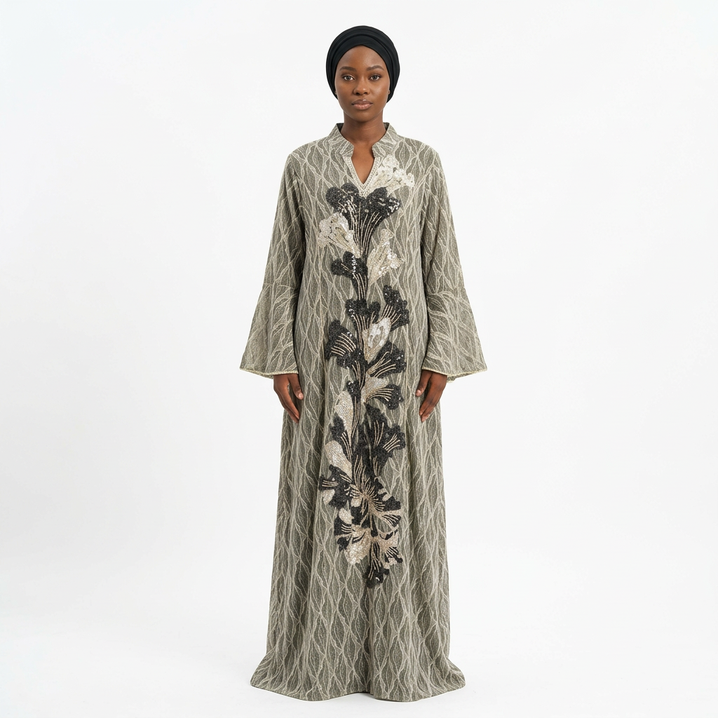 Single Nigerian woman wearing the grey botanical shimmer abaya