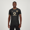Nigerian male model wearing Borussia Dortmund away black gold jersey