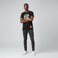 Nigerian male model wearing men's black retro gaming Pac-Man graphic t-shirt