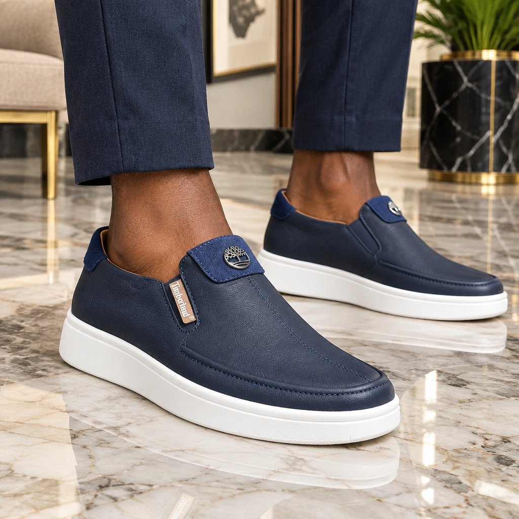 Navy Leather Slip-On Platform Sneaker with Suede Heel Tab – Model Shot