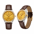 Two-tone diamond bezel dress watch with gold waffle dial and brown leather strap, front and side view on white background