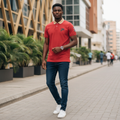 Young Nigerian male model wearing red graphic polo shirt, front view, Nigerian urban background