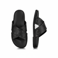 Men's black monogram cross-strap slide sandals ghost mannequin front and side view