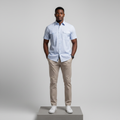 Nigerian male model wearing light blue pinstripe short-sleeved shirt