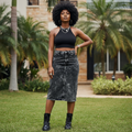 Nigerian female model wearing Women's Black Acid-Wash Denim Midi Pencil Skirt