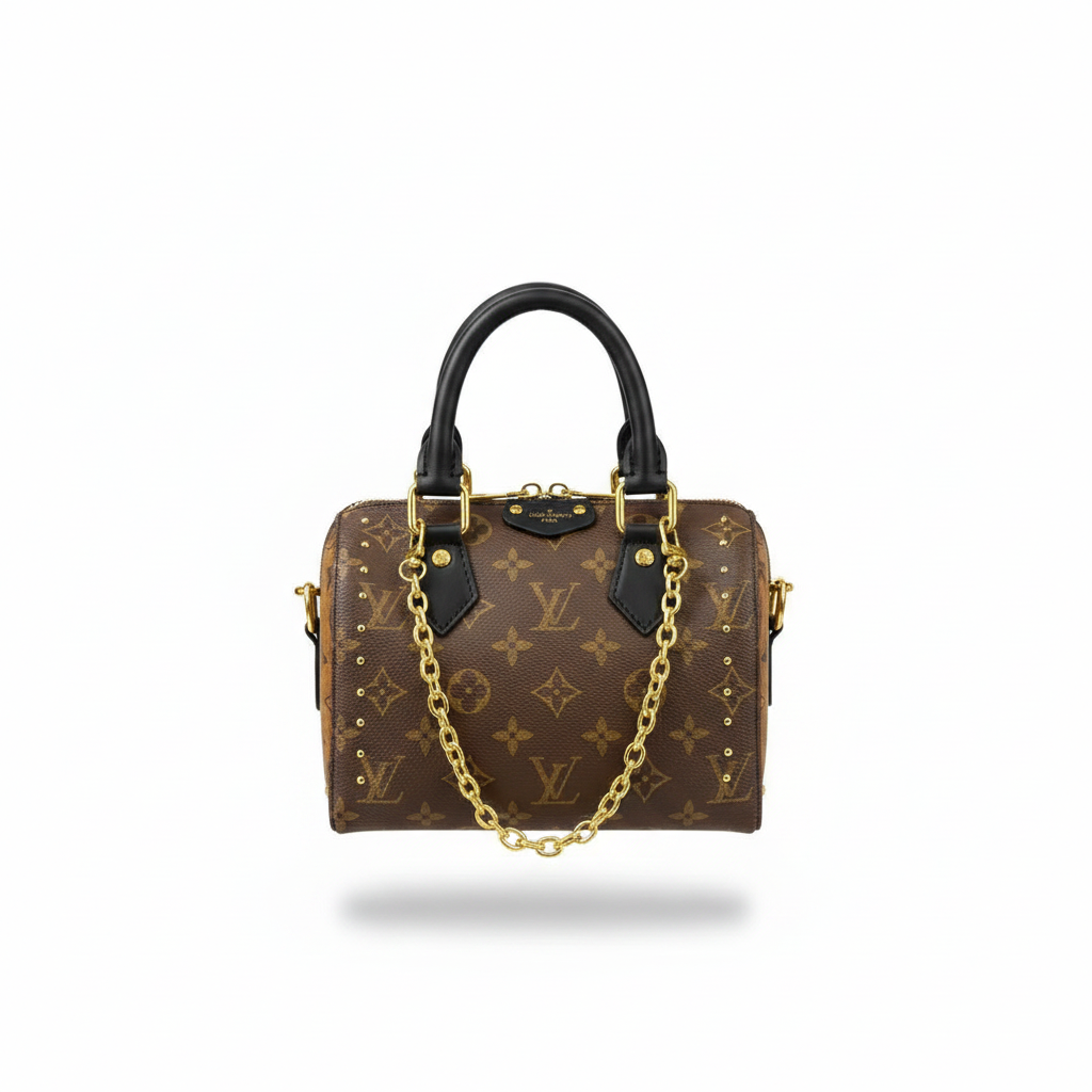 Tan monogram mini speedy bag with gold studs and yellow leather trim on white background