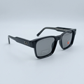 AI-edited glossy black square sunglasses catalog view