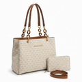 Ivory monogram tote with brown chain-link handles, matching purse and separate brown strap on white