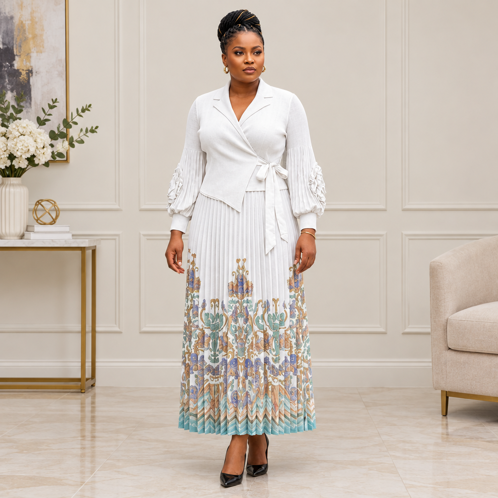 Adult Black woman wearing white pleated dress with multicolour patterned hem