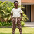 Nigerian child model wearing brown cargo jogger pants with side pockets