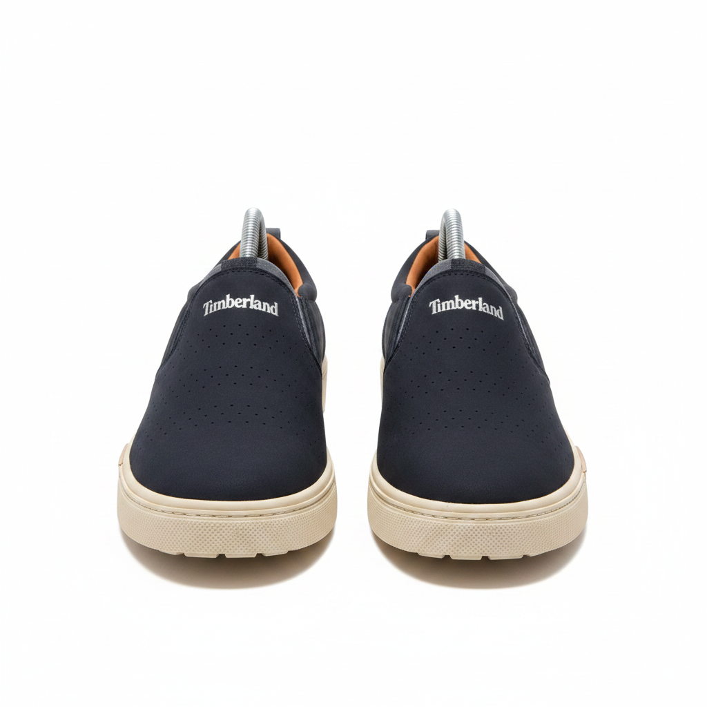 Timberland navy blue lug sole slip-on loafer ghost mannequin product shot, plain white background