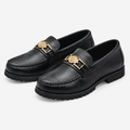 Black men's gold-detail moc-toe loafers shown as a complete pair