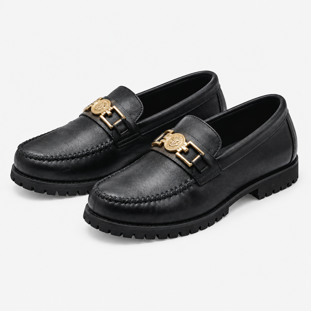 Black men's gold-detail moc-toe loafers shown as a complete pair
