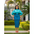 Nigerian female model wearing two-tone teal balloon sleeve bodycon midi dress