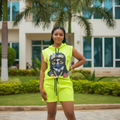 Nigerian female model wearing neon yellow-green sleeveless hoodie graphic two-piece short set
