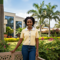 Nigerian female model wearing Women's Pastel Yellow Contrast Trim Button-Front Top