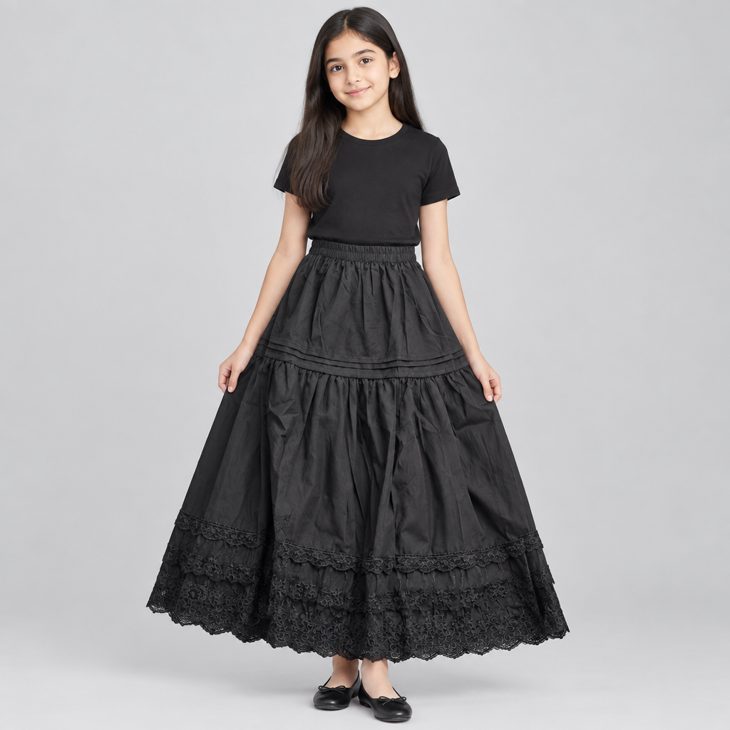 Child model wearing black tiered lace-hem skirt
