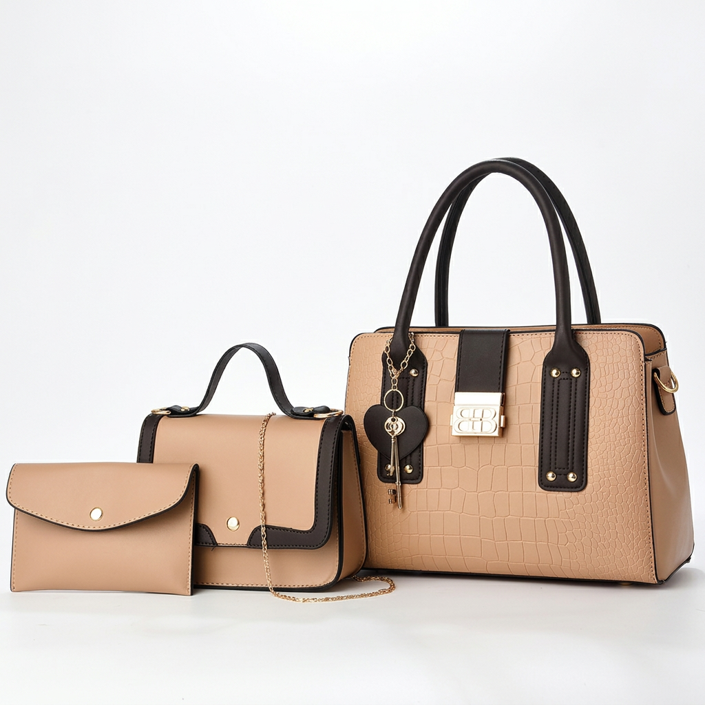 Light-tan three-piece handbag set with black trim, embossed tote, flap bag and pouch on white