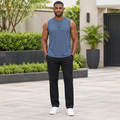 Adult male model wearing reconstructed blue-grey sleeveless top