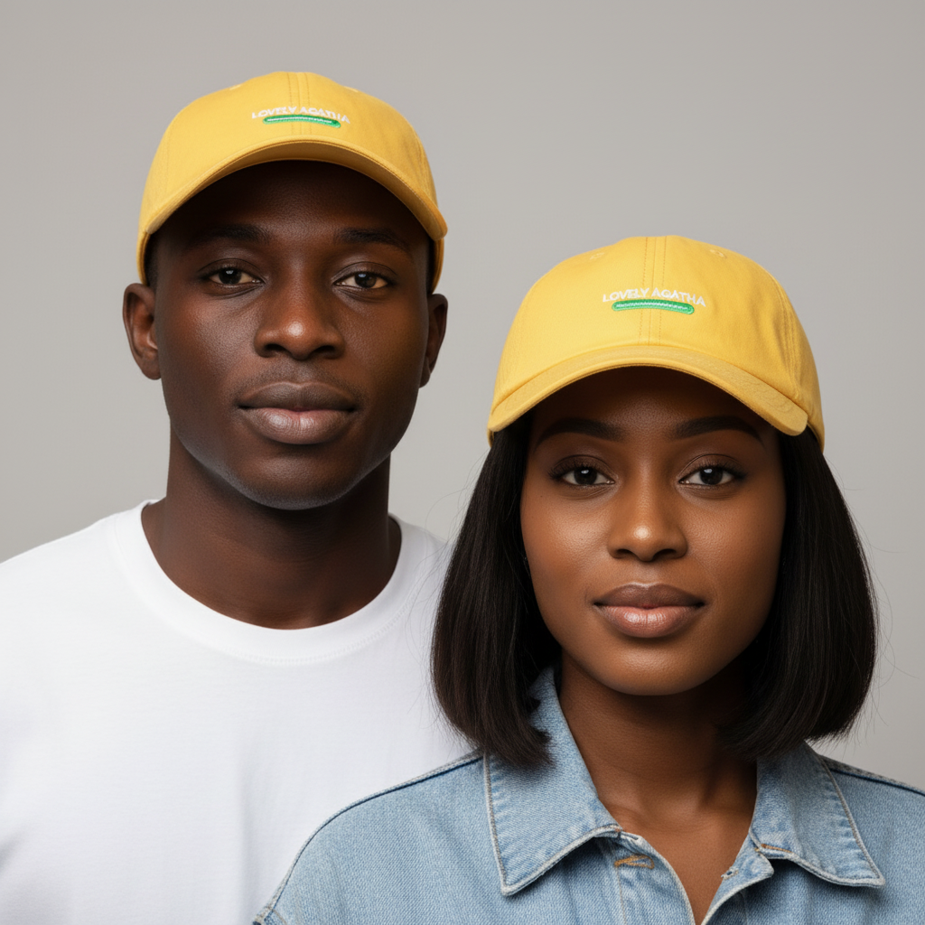 Nigerian male and female models wearing bright yellow Lovely Agatha embroidered dad cap