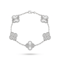 Silver engraved and stone-accent clover bracelet on white