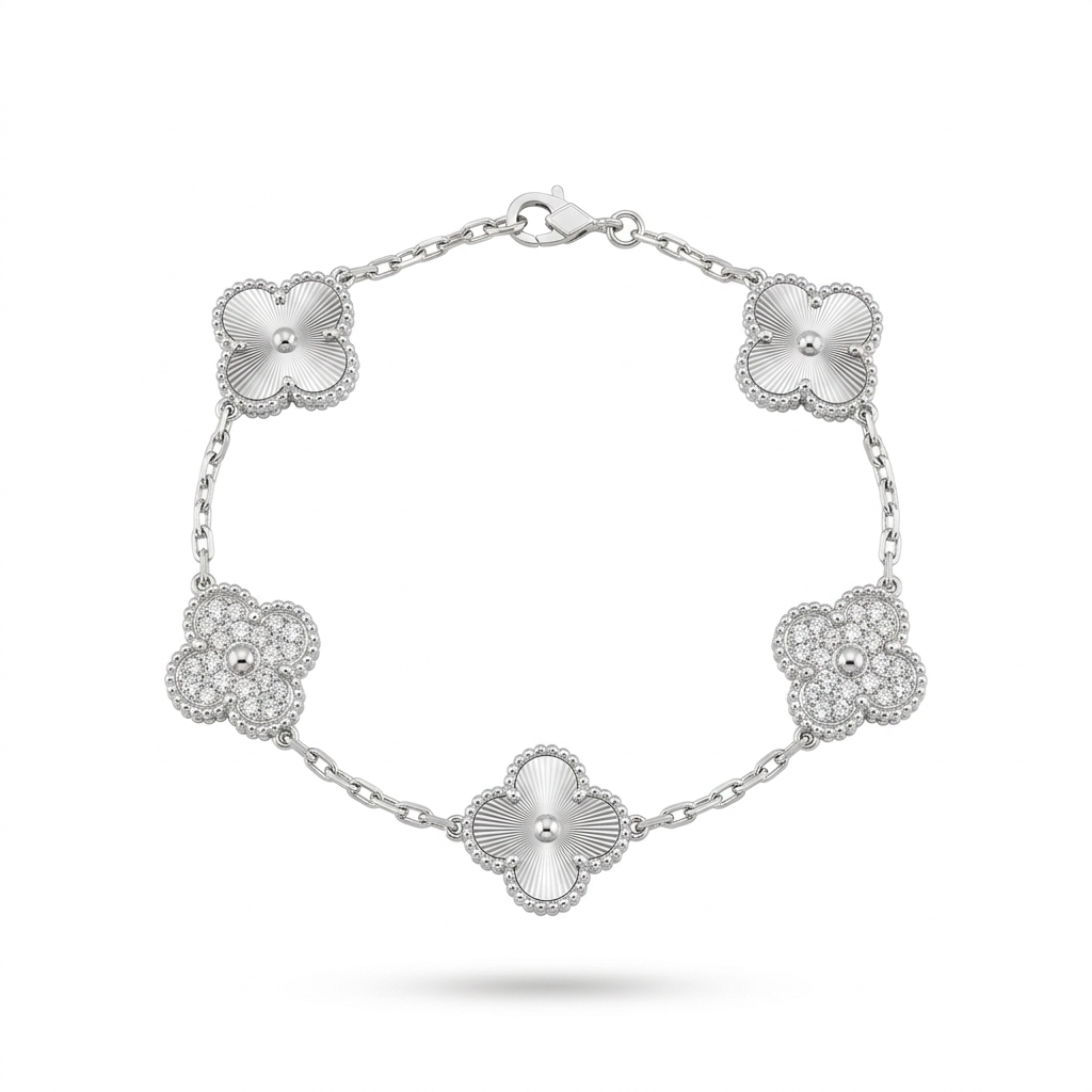 Silver engraved and stone-accent clover bracelet on white