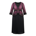 Purple patterned top and black pleated maxi skirt on an invisible mannequin