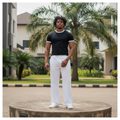 Nigerian male model full body wearing men's black white trim ringer crew-neck t-shirt